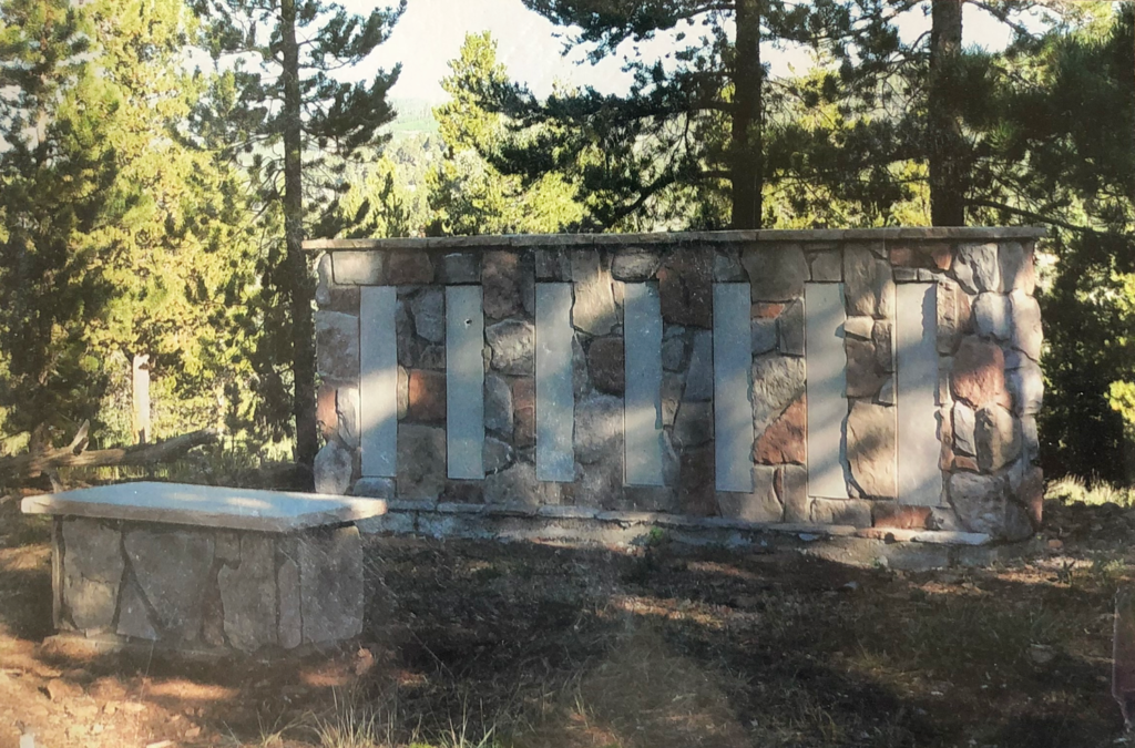 Crystal Lakes Memory Wall with engraved plaques honoring residents, friends, and loved ones.